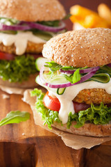 veggie carrot and oats burger with cucumber onion tomato