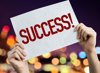 Success placard with bokeh background