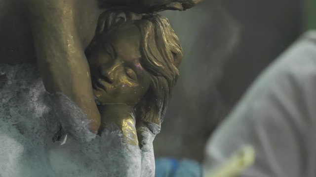 laying a patina from titanium white on bronze