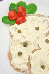 Vitello tonnato - slices of veal with tuna sauce and capers