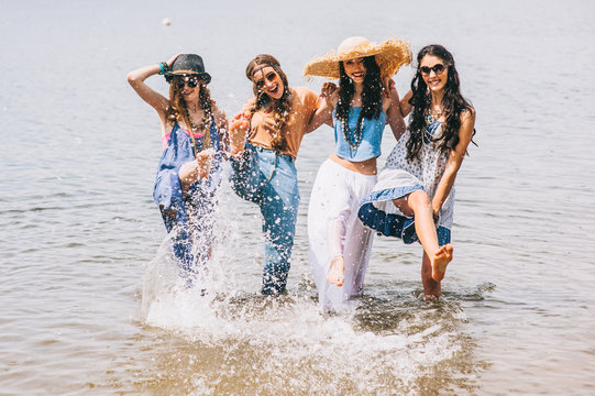 four beautiful girls on the beach