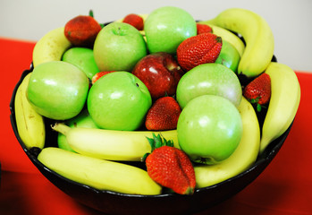 bowl of healthy fresh fruits on the table