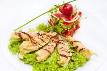 tempura shrimp with a salad of vegetables on a white background in the restaurant