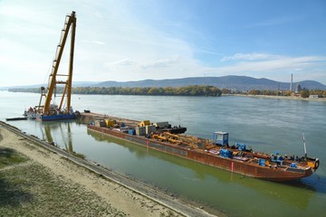 Fototapeta na wymiar Barges with construction equipment