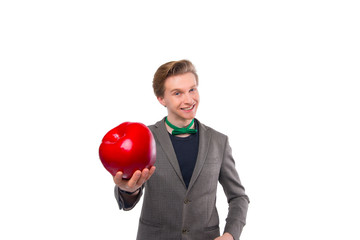 Portrait of handsome manager holding a red apple