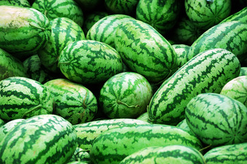 stacking watermelons background