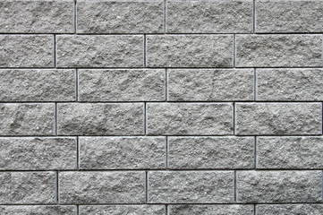 Detail of building a new house, a brick wall, background of brick
