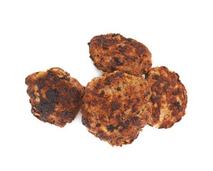 Pile of small hand made cutlets isolated over white background
