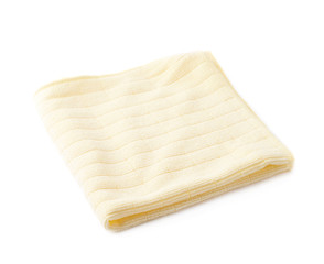 Yellow rag over white isolated background