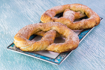Fresh baked soft cinnamon flavored pretzels.