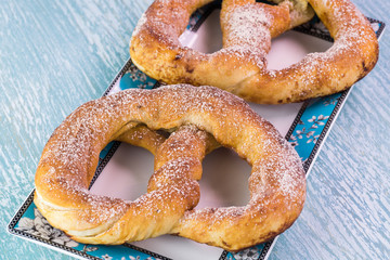 Fresh baked soft cinnamon flavored pretzels.