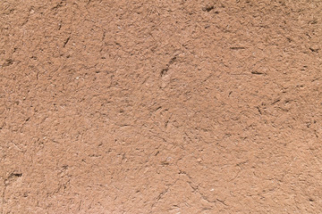 Adobe wall. Made of mud and straw.