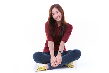 Young Asian student isolated on white background.