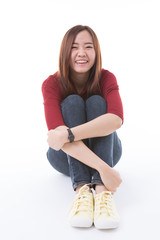 Young Asian student isolated on white background.