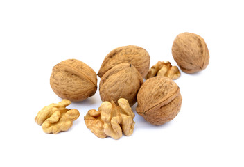 Several walnuts isolated on white background