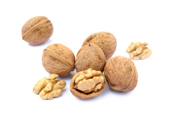 Several walnuts isolated on white background