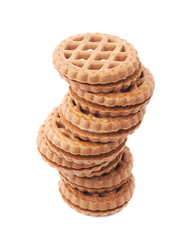 Twisted stack of cookies isolated over the white background