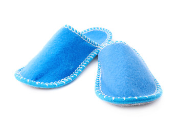 Pair of house slippers isolated over white background