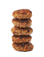 Stack of small hand made cutlets isolated over white background