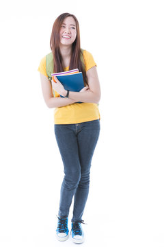 Young asian student girl with book. Isolated on white background