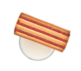 Glass of milk and cookie isolated over the white background