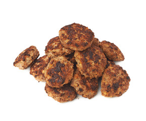 Pile of small hand made cutlets isolated over white background