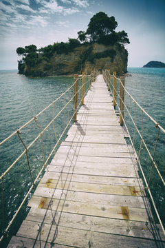 Hanging wooden bridge over the sea Cameo Island Zakynthos Greece © leszekglasner