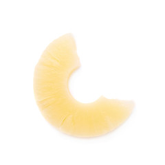 Bitten canned pineapple isolated over white background