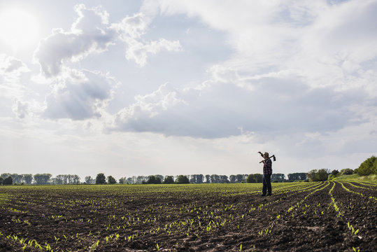 Farmer standing in a field