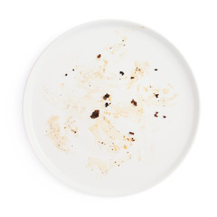 Dirty big plate over white isolated background