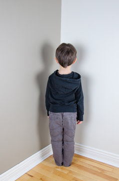 Kid facing corner