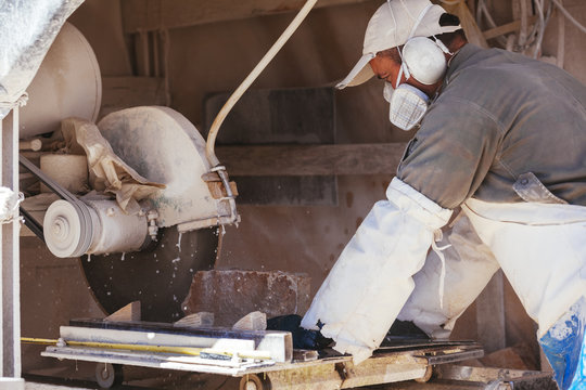 Bosnia and Herzegovina, Bileca, Stone cuter working on cutting machine