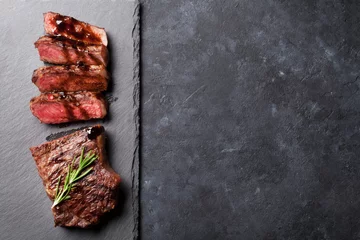 Photo sur Plexiglas Steakhouse Steak de boeuf tranché grillé