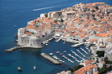 Fototapeta na wymiar OLD TOWN DUBROVNIK CROATIA - MAY 2016 - An overview from Mount Syd of the walled Old Town of Dubrovnik a World Heritage site