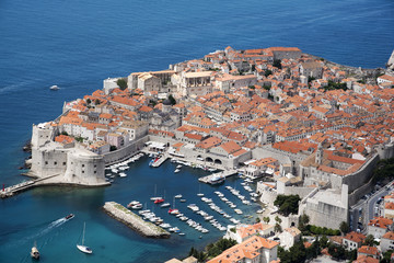 Naklejka premium OLD TOWN DUBROVNIK CROATIA - MAY 2016 - An overview from Mount Syd of the walled Old Town of Dubrovnik a World Heritage site