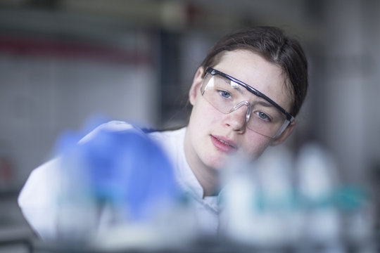 Lab technician examining sample