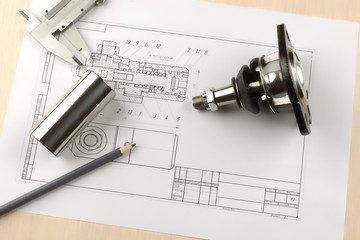 Ball joint to a cut and drawing the steel parts on the table