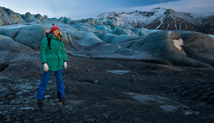 Young woman standing on a glacier in Iceland.
The bigest European glacier Vatnajokull