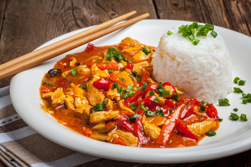 Chinese chicken with vegetables and rice.