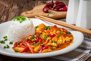 Chinese chicken with vegetables and rice.
