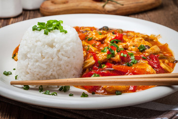 Chinese chicken with vegetables and rice.