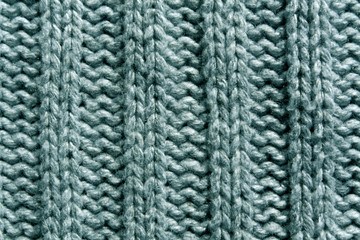 Abstract gray knitting texture close-up.