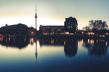Germany, Berlin, TV Tower, spree river and water reflection in the evening