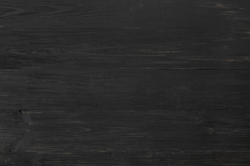 Black rustic wood texture and background.