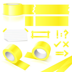 Yellow tape rolls and objects over white