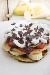 pancakes with strawberries, banana, blueberries and chocolate...