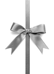 Silver silk ribbon with beautiful bow isolated on white background