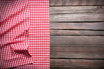 Checkered napkin on wooden background