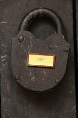 love text and old padlock