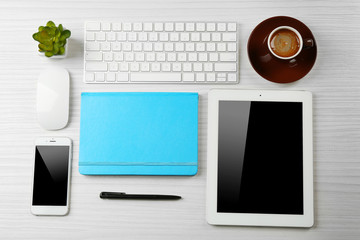 Business desk with equipment, flat lay
